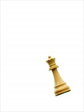 White queen chess piece on white background. Photo : David Arky