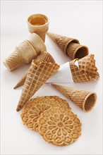 Close up of empty ice cream cones and wafers.