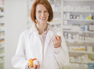 Portrait of pharmacist in drug store. Photo: Jamie Grill Photography