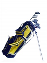 Golf bag with clubs on white background. Photo: David Arky