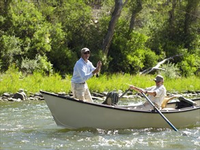 USA, Colorado, Pair of men fly-fishing. Photo : John Kelly