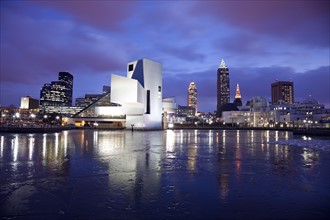 USA, Ohio, Rock and Roll Hall of Fame and Museum across frozen lake at dusk. Photo: Henryk Sadura