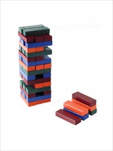 Studio shot of colorful wooden jenga blocks. Photo: David Arky