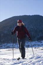 USA, California, Lake Tahoe, Mid adult woman skiing. Photo: Noah Clayton