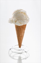 Close up of vanilla ice cream cone.