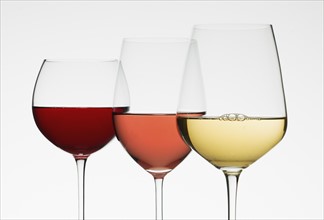 Close up of glasses of different wines.