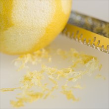 Close-up of lemon and grater. Photo : Jamie Grill Photography