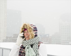 Jersey City, New Jersey, portrait of woman talking on mobile phone. Photo: Jamie Grill Photography