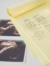 Sonogram picture and baby names list. Photo : Jamie Grill Photography
