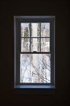 USA, Maine, Camden, dark room with window. Photo : Daniel Grill