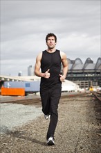 USA, Washington, Seattle, man jogging. Photo : Take A Pix Media