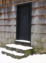 USA, New York State, Door to barn covered with snow. Photo : John Kelly