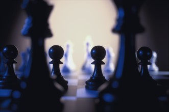 Pawns on chess board. Photo: Antonio M. Rosario