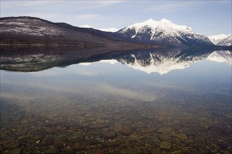 USA, Colorado, Mountains reflected in lake. Photo : Noah Clayton