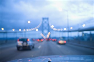 USA, San Francisco, Driving on Golden Gate Bridge. Photo: Noah Clayton