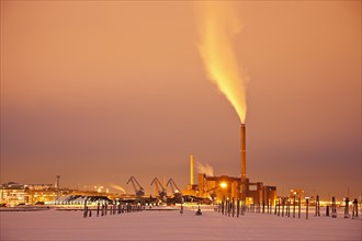 Finland, Helsinki, Smoking chimney in dock. Photo : Henryk Sadura