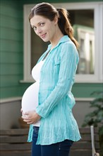 Portrait of expectant mother. Photo : Rob Lewine