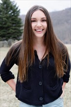 USA, New Jersey, Califon, Portrait of young smiling teenage girl (16-17). Photo : Pauline St.Denis