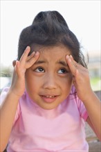 Girl (4-5) with headache. Photo : Noah Clayton
