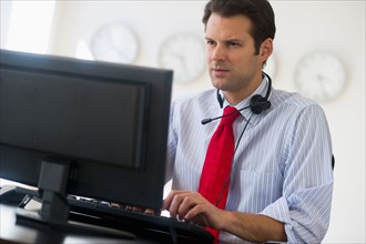 Businessman working on computer.