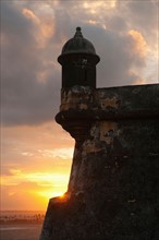 Puerto Rico, Old San Juan, Fort San Felipe del Morro at sunset.