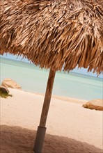 Aruba, palapa on beach. Photo : Daniel Grill
