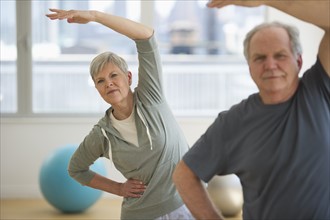 Senior people exercising.