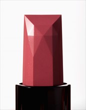 Studio Shot, Close-up view of pink lipstick. Photo : Winslow Productions