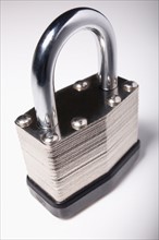 Close-up studio shot of silver padlock . Photo : Winslow Productions