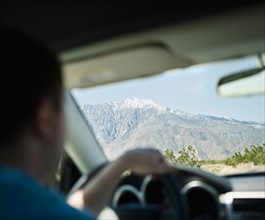 USA, California, Palm Springs, Coachella Valley, San Gorgonio Pass, Close up of man inside car.