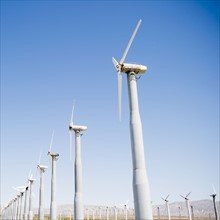 USA, California, Palm Springs, Coachella Valley, San Gorgonio Pass, Wind turbines against blue sky.