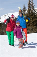 USA, Colorado, Telluride, Grandparents with girl (10-11) posing during ski holiday. Photo :