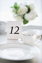 Close up of place setting with number 12.