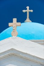 Greece, Cyclades Islands, Mykonos, Church dome with cross.
