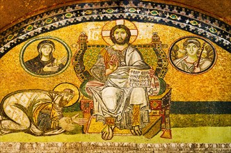 Turkey, Istanbul, Mosaic of Leo VI kneeling before Jesus in Haghia Sophia Mosque .