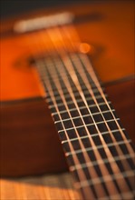 Close up of acoustic guitar. Photo : Daniel Grill