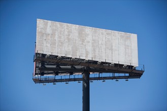 Empty billboard against clear sky. Photo: fotog