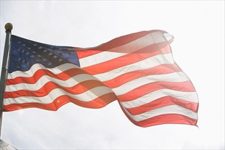 American flag against sky. Photo: fotog