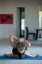 Mature woman exercising. Photo: Rob Lewine