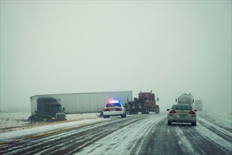USA, Illinois, Springfield, Semi truck accident on highway during storm. Photo : Henryk Sadura
