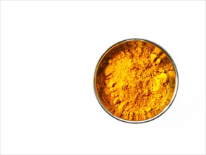 Studio shot of Curry Powder in pan on white background. Photo : David Arky
