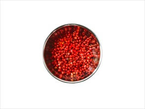 Studio shot of Red Chili Flakes in pan on white background. Photo: David Arky