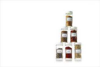 Studio shot of Jars with spices on white background. Photo: David Arky