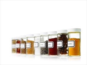 Studio shot of Jars with spices on white background. Photo : David Arky