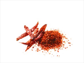 Studio shot of Red Chili Powder and Whole Red Chilies on white background. Photo: David Arky