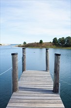 USA, Massachusetts, Pier at lake. Photo: Johannes Kroemer