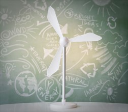 Close up of model of wind turbine against blackboard. Photo: Jamie Grill