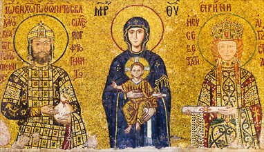 Turkey, Istanbul, Mosaic of Virgin mary holding Jesus with Emperor John II Comnenus and Empress Irene.