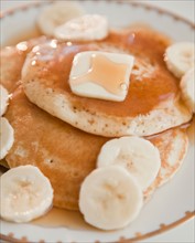 Close up of pancakes with bananas. Photo: Jamie Grill