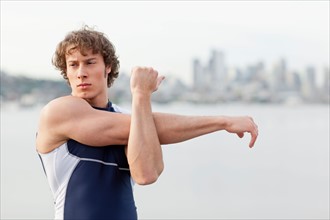 USA, Washington State, Seattle, Young athlete doing workout. Photo : Take A Pix Media